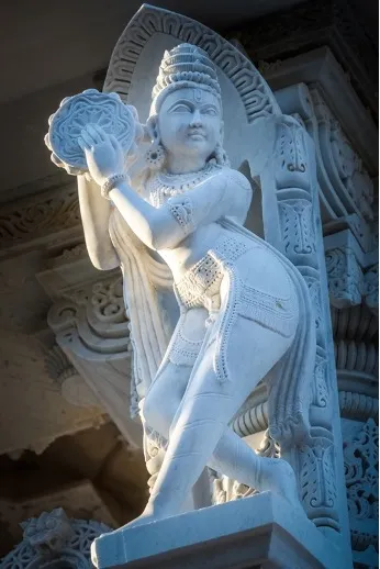 Carving at the BAPS Mandir in Bartlett, Illinois Depicting a Traditional Indian Drum